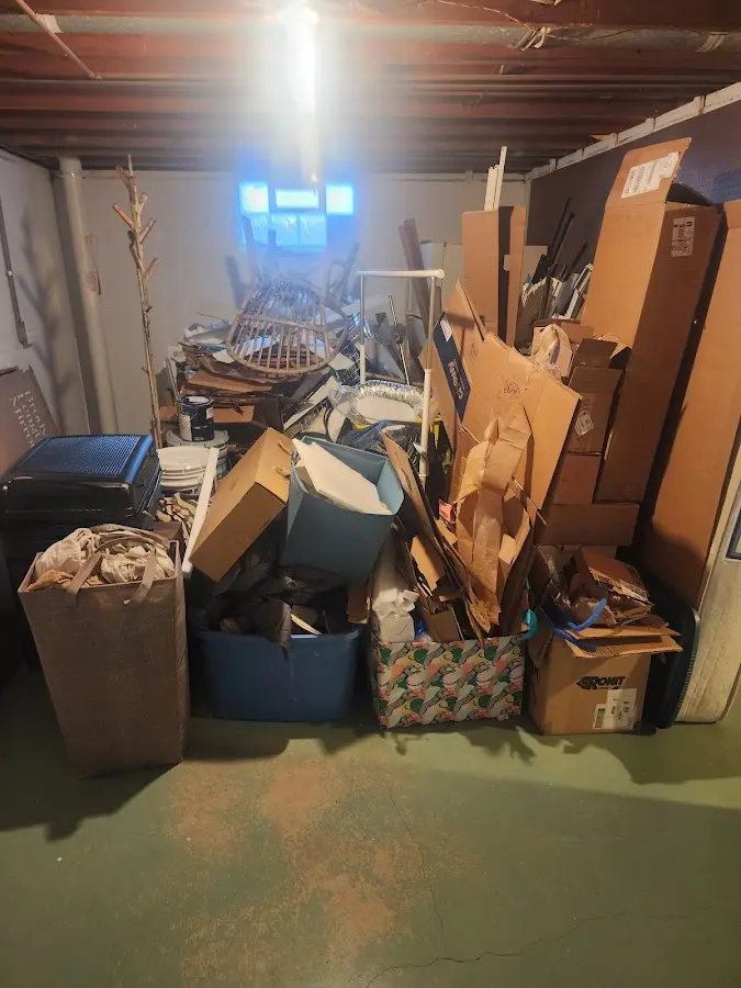 Roll-off dumpster container at job site for Concrete Dumpster Rental in Sterling